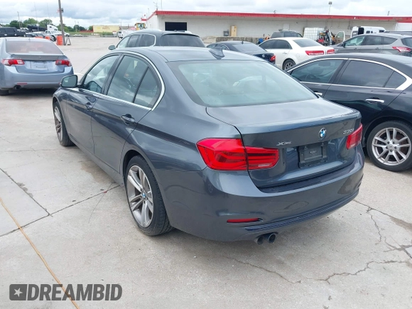2018 BMW 3 Series 330i xDrive with VIN WBA8D9C55JEM32703, listed as a IAAI auction lot 42478412 with 79,000 mi miles and . Bid and sale history available at DreamBid. Image 3.