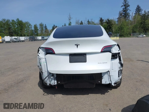 2023 Tesla Model Y Long Range with VIN 7SAYGDEE4PF676167, listed as a IAAI auction lot 42147909 with 20,488 mi miles. Bid and sale history available at carsss.com. Image 17.