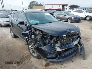 2019 Jeep Cherokee Latitude Plus with VIN 1C4PJLLN4KD119783, listed as a IAAI auction lot 41223282 with 84,917 mi miles. Bid and sale history available at carsss.com. Image 1.