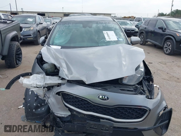 2020 Kia Sportage LX with VIN KNDPM3AC5L7720838, listed as a IAAI auction lot 41458808 with 52,689 mi miles and . Bid and sale history available at DreamBid. Image 11.