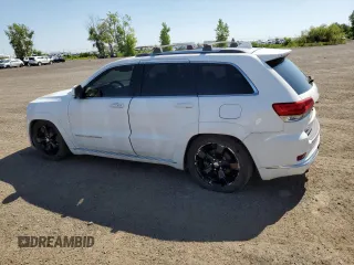 2015 Jeep Grand Cherokee Summit with VIN 1C4RJFJM3FC731831, listed as a Copart auction lot 66570534 with 230,193 mi miles and Clean title. Bid and sale history available at DreamBid. Image 2.