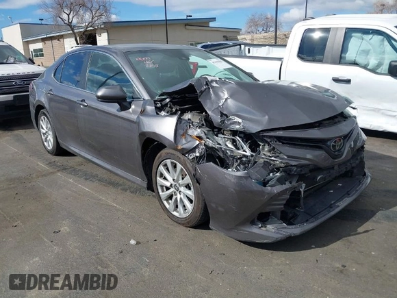 2020 Toyota Camry LE with VIN 4T1C11AK3LU363417, listed as a IAAI auction lot 41430382 with 130,837 mi miles. Bid and sale history available at carsss.com. Image 1.