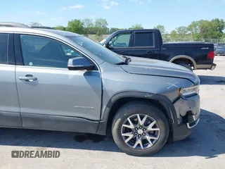 2023 GMC Acadia SLT with VIN 1GKKNML46PZ130813, listed as a IAAI auction lot 42614040 with 56,086 mi miles and . Bid and sale history available at DreamBid. Image 17.