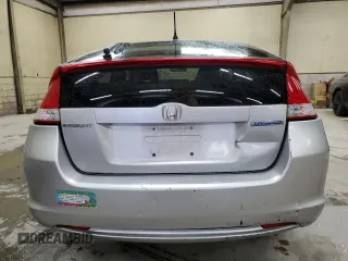 2010 Honda Insight EX with VIN JHMZE2H70AS037057, listed as a Copart auction lot 52704985 with 162,897 mi miles and Clean Title. Bid and sale history available at DreamBid. Image 6.