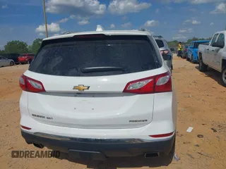 2019 Chevrolet Equinox Premier z VIN 2GNAXPEX9K6177386, wystawiony jako IAAI lot #42172103 z przebiegiem 61 045 mil mil oraz . Historia ofert i sprzedaży dostępna na DreamBid. Obrazek 16.