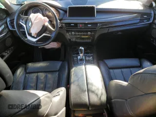 2014 BMW X5 xDrive35i z VIN 5UXKR0C59E0K51868, wystawiony jako Copart lot #79139994 z przebiegiem Nie podano mil oraz Szkoda całkowita • Salvage title. Historia ofert i sprzedaży dostępna na DreamBid. Obrazek 8.