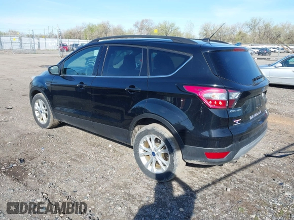 2018 Ford Escape SE z VIN 1FMCU9GD5JUB15259, wystawiony jako IAAI lot #42182040 z przebiegiem 122 194 mil mil oraz . Historia ofert i sprzedaży dostępna na DreamBid. Obrazek 3.