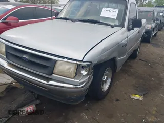 1996 Ford Ranger XL with VIN 1FTCR10A1TTA64228, listed as a IAAI auction lot 41944707 with 218,656 mi miles. Bid and sale history available at carsss.com. Image 6.