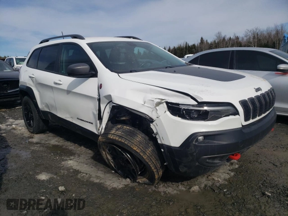 2021 Jeep Cherokee Trailhawk with VIN 1C4PJMBX4MD138927, listed as a Copart auction lot 51919555 with 92,759 mi miles and Salvage title. Bid and sale history available at DreamBid. Image 4.
