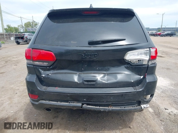 2015 Jeep Grand Cherokee Altitude z VIN 1C4RJFAG5FC682058, wystawiony jako IAAI lot #42352814 z przebiegiem 228 067 mil mil oraz . Historia ofert i sprzedaży dostępna na DreamBid. Obrazek 16.