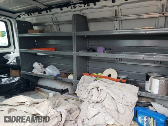 2010 Chevrolet Express Cargo Van with VIN 1GCUGADX5A1176855, listed as a Copart auction lot 49880964 with 198,739 mi miles and Salvage Title. Bid and sale history available at carsss.com. Image 10.