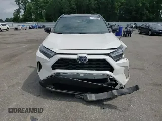 2022 Toyota RAV4 Hybrid XSE with VIN 2T3E6RFVXNW031612, listed as a Copart auction lot 60544055 with 99,831 mi miles and Salvage title. Bid and sale history available at DreamBid. Image 14.