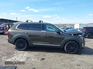 2021 Kia Telluride SX with VIN 5XYP5DHC2MG162119, listed as a IAAI auction lot 41881250 with 112,024 mi miles and . Bid and sale history available at DreamBid. Image 12.