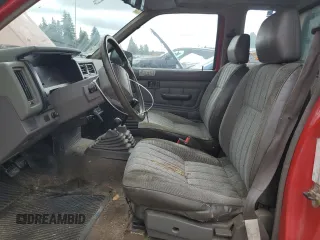 1989 Nissan Hardbody E z VIN 1N6ND16Y9KC352795, wystawiony jako Copart lot #72202814 z przebiegiem 242 396 mil mil oraz Tytuł czysty. Historia ofert i sprzedaży dostępna na DreamBid. Obrazek 7.