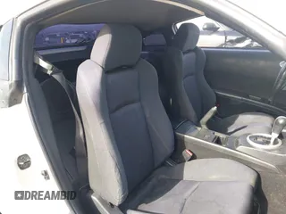 2004 Nissan 350Z Touring with VIN JN1AZ34D14M102966, listed as a IAAI auction lot 41921270 with 182,633 mi miles. Bid and sale history available at carsss.com. Image 8.