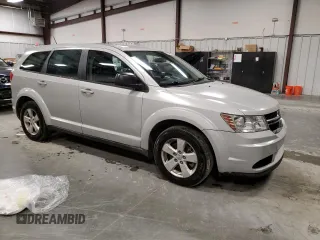 2013 Dodge Journey American Value z VIN 3C4PDCAB9DT536846, wystawiony jako Copart lot #86245174 z przebiegiem 162 677 mil mil oraz Szkoda całkowita • Salvage title. Historia ofert i sprzedaży dostępna na DreamBid. Obrazek 4.