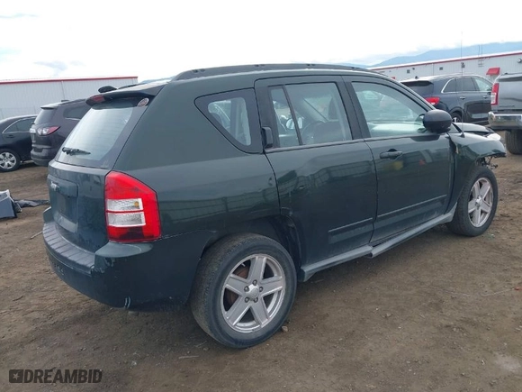 2010 Jeep Compass Sport with VIN 1J4NT4FB4AD608833, listed as a IAAI auction lot 40559052 with NaN miles. Bid and sale history available at carsss.com. Image 4.
