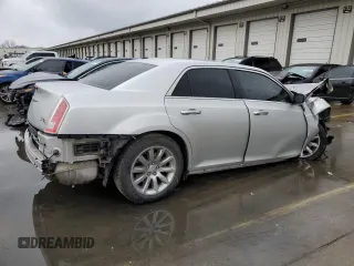 2012 Chrysler 300 with VIN 2C3CCAET5CH288759, listed as a Copart auction lot 83869294 with 100,575 mi miles and Salvage Title. Bid and sale history available at carsss.com. Image 3.