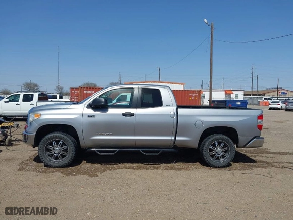 2014 Toyota Tundra 4WD Truck SR with VIN 5TFUW5F12EX379093, listed as a IAAI auction lot 41730439 with 133,409 mi miles. Bid and sale history available at carsss.com. Image 14.