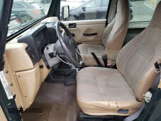 1999 Jeep Wrangler Sport with VIN 1J4FY19S2XP446059, listed as a Copart auction lot 84321994 with 183,068 mi miles and Clean Title. Bid and sale history available at carsss.com. Image 7.