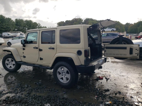 2011 Jeep Wrangler Unlimited Sahara with VIN 1J4BA5H19BL593658, listed as a Copart auction lot 71947684 with 122,323 mi miles and Salvage Title. Bid and sale history available at carsss.com. Image 2.