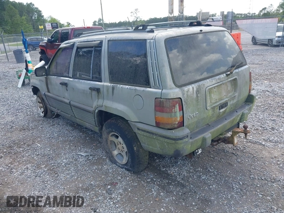 1995 Jeep Grand Cherokee Laredo with VIN 1J4GZ58S6SC756256, listed as a IAAI auction lot 42169534 with 255,516 mi miles. Bid and sale history available at carsss.com. Image 3.