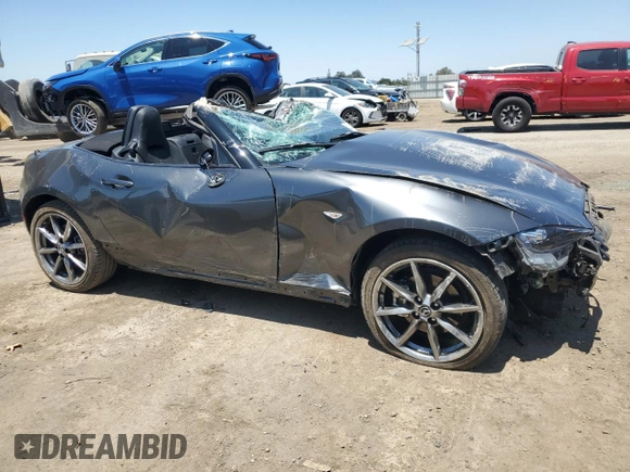2021 Mazda MX-5 Miata Grand Touring with VIN JM1NDAD79M0458827, listed as a Copart auction lot 62238855 with 20,497 mi miles and Salvage title. Bid and sale history available at DreamBid. Image 4.