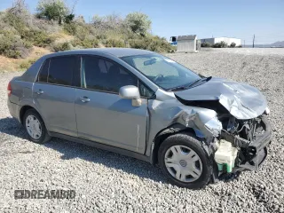 2010 Nissan Versa S with VIN 3N1BC1AP8AL457552, listed as a Copart auction lot 59703695 with 149,160 mi miles and Salvage title. Bid and sale history available at DreamBid. Image 4.