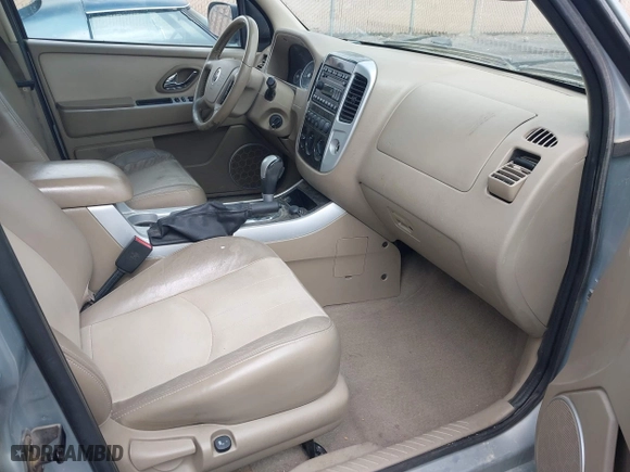 2005 Mercury Mariner Luxury with VIN 4M2CU57145DJ22822, listed as a IAAI auction lot 41932692 with 167,263 mi miles. Bid and sale history available at carsss.com. Image 5.
