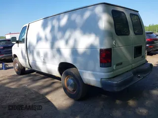 2004 Ford Econoline Cargo Commercial with VIN 1FTNE24W04HA50342, listed as a IAAI auction lot 42145274 with 158,408 mi miles and . Bid and sale history available at carsss.com. Image 3.