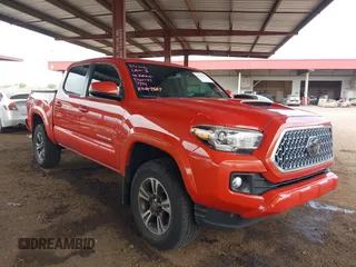 2018 Toyota Tacoma SR z VIN 3TMCZ5AN8JM154349, wystawiony jako IAAI lot #42761624 z przebiegiem 30 944 mil mil oraz . Historia ofert i sprzedaży dostępna na DreamBid. Obrazek 1.