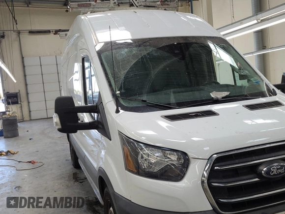 2020 Ford Transit Cargo z VIN 1FTBR1XG3LKB79165, wystawiony jako IAAI lot #42763042 z przebiegiem 140 992 mil mil oraz . Historia ofert i sprzedaży dostępna na DreamBid. Obrazek 50.