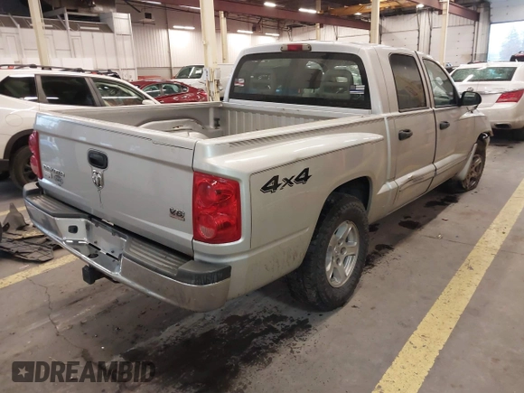 2005 Dodge Dakota Laramie with VIN 1D7HW58N75S188127, listed as a IAAI auction lot 41209206 with 117,480 mi miles and . Bid and sale history available at DreamBid. Image 4.