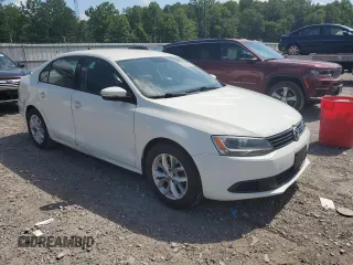 2014 Volkswagen Jetta SE with VIN 3VWD17AJ4EM265925, listed as a Copart auction lot 63925425 with 135,347 mi miles and Clean title. Bid and sale history available at DreamBid. Image 4.