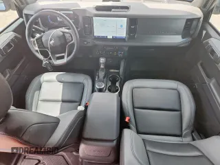 2024 Ford Bronco Big Bend with VIN 1FMDE7BH7RLA03788, listed as a Copart auction lot 65085065 with 10,597 mi miles and Salvage title. Bid and sale history available at DreamBid. Image 8.