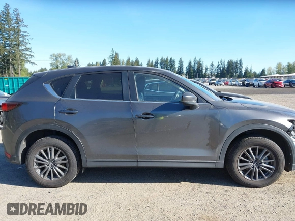 2021 Mazda CX-5 Touring with VIN JM3KFBCM7M1370676, listed as a IAAI auction lot 41975127 with 41,574 mi miles. Bid and sale history available at carsss.com. Image 14.