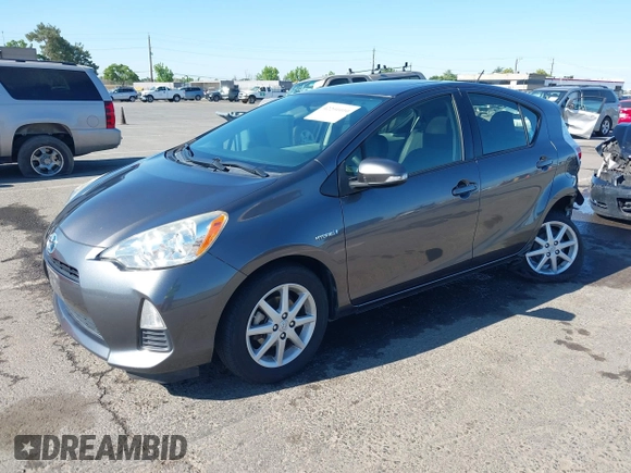 2014 Toyota Prius One z VIN JTDKDTB39E1078879, wystawiony jako IAAI lot #42201010 z przebiegiem 147 544 mil mil oraz . Historia ofert i sprzedaży dostępna na DreamBid. Obrazek 2.