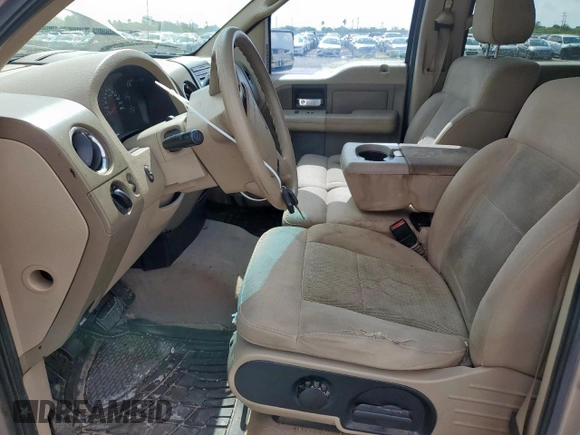 2004 Ford F-150 XLT with VIN 1FTRW12W94KC10443, listed as a Copart auction lot 63380525 with 206,815 mi miles and Salvage title. Bid and sale history available at DreamBid. Image 7.