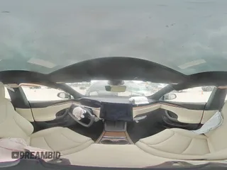 2023 Tesla Model S z VIN 5YJSA1E58PF531166, wystawiony jako Copart lot #51827565 z przebiegiem Nie podano mil oraz Szkoda całkowita • Salvage title. Historia ofert i sprzedaży dostępna na DreamBid. Obrazek 12.
