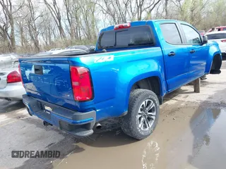 2021 Chevrolet Colorado 4WD Z71 z VIN 1GCGTDEN4M1212479, wystawiony jako IAAI lot #41937713 z przebiegiem 56 164 mil mil oraz . Historia ofert i sprzedaży dostępna na DreamBid. Obrazek 4.