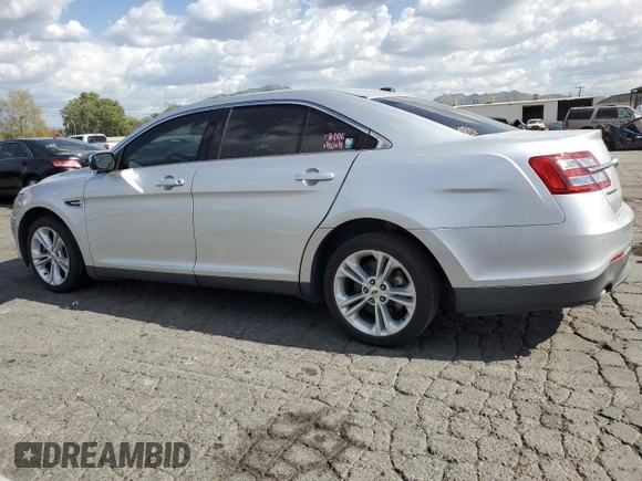 2015 Ford Taurus SEL with VIN 1FAHP2E88FG121647, listed as a Copart auction lot 51660585 with 155,686 mi miles and Clean Title. Bid and sale history available at DreamBid. Image 2.