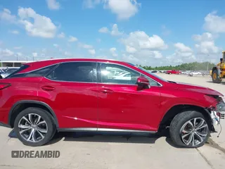 2019 Lexus RX 350 with VIN 2T2ZZMCA0KC139977, listed as a IAAI auction lot 42367672 with 100,312 mi miles and . Bid and sale history available at DreamBid. Image 14.