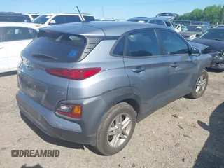 2021 Hyundai Kona SE z VIN KM8K1CAA3MU674975, wystawiony jako IAAI lot #42043579 z przebiegiem 52 240 mil mil oraz . Historia ofert i sprzedaży dostępna na DreamBid. Obrazek 4.