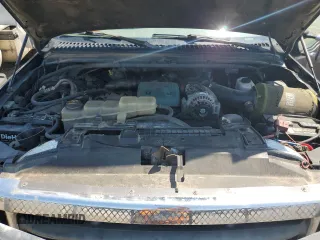 2000 Ford F-350 XL with VIN 1FTSW31F3YEB20854, listed as a Copart auction lot 61717865 with 209,288 mi miles and Salvage title. Bid and sale history available at DreamBid. Image 11.