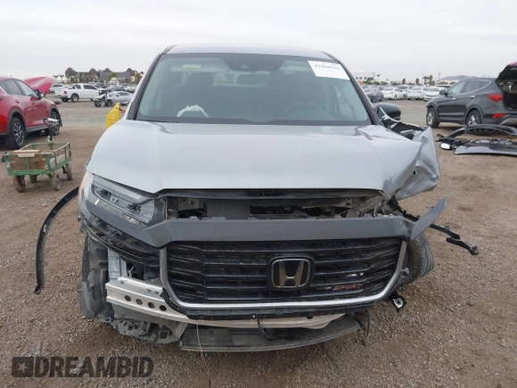 2023 Honda Ridgeline Sport z VIN 5FPYK3F16PB049866, wystawiony jako IAAI lot #41068916 z przebiegiem Nie podano mil oraz . Historia ofert i sprzedaży dostępna na DreamBid. Obrazek 12.