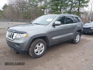 2012 Jeep Grand Cherokee Laredo with VIN 1C4RJFAG0CC270545, listed as a IAAI auction lot 41940781 with 200,529 mi miles. Bid and sale history available at carsss.com. Image 2.