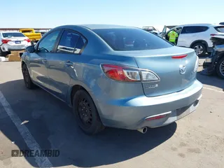 2010 Mazda Mazda3 i Touring with VIN JM1BL1SG5A1164355, listed as a IAAI auction lot 42044865 with 127,809 mi miles. Bid and sale history available at carsss.com. Image 3.