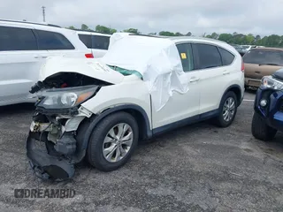 2013 Honda CR-V EX-L with VIN 5J6RM4H74DL043789, listed as a IAAI auction lot 41995414 with 99,787 mi miles and . Bid and sale history available at DreamBid. Image 2.