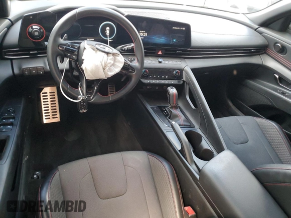 2023 Hyundai Elantra N Line z VIN KMHLR4AF1PU546303, wystawiony jako Copart lot #56982655 z przebiegiem 30 486 mil mil oraz Szkoda całkowita • Salvage title. Historia ofert i sprzedaży dostępna na DreamBid. Obrazek 8.