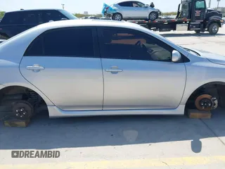 2009 Toyota Corolla with VIN 1NXBU40E39Z102927, listed as a IAAI auction lot 41864609 with 82,840 mi miles. Bid and sale history available at carsss.com. Image 13.